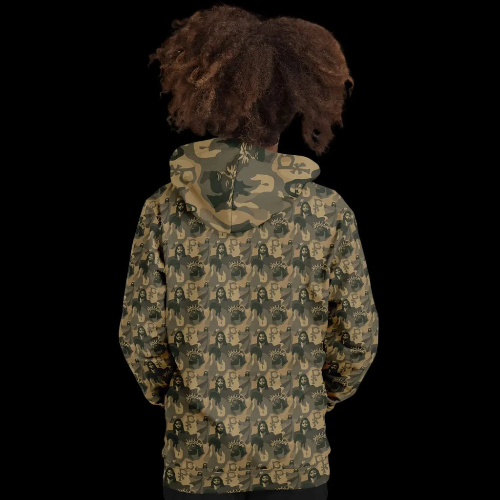 Mockup view of the back of a kids hoodie with a jesus camouflage pattern worn by a girl against a black background