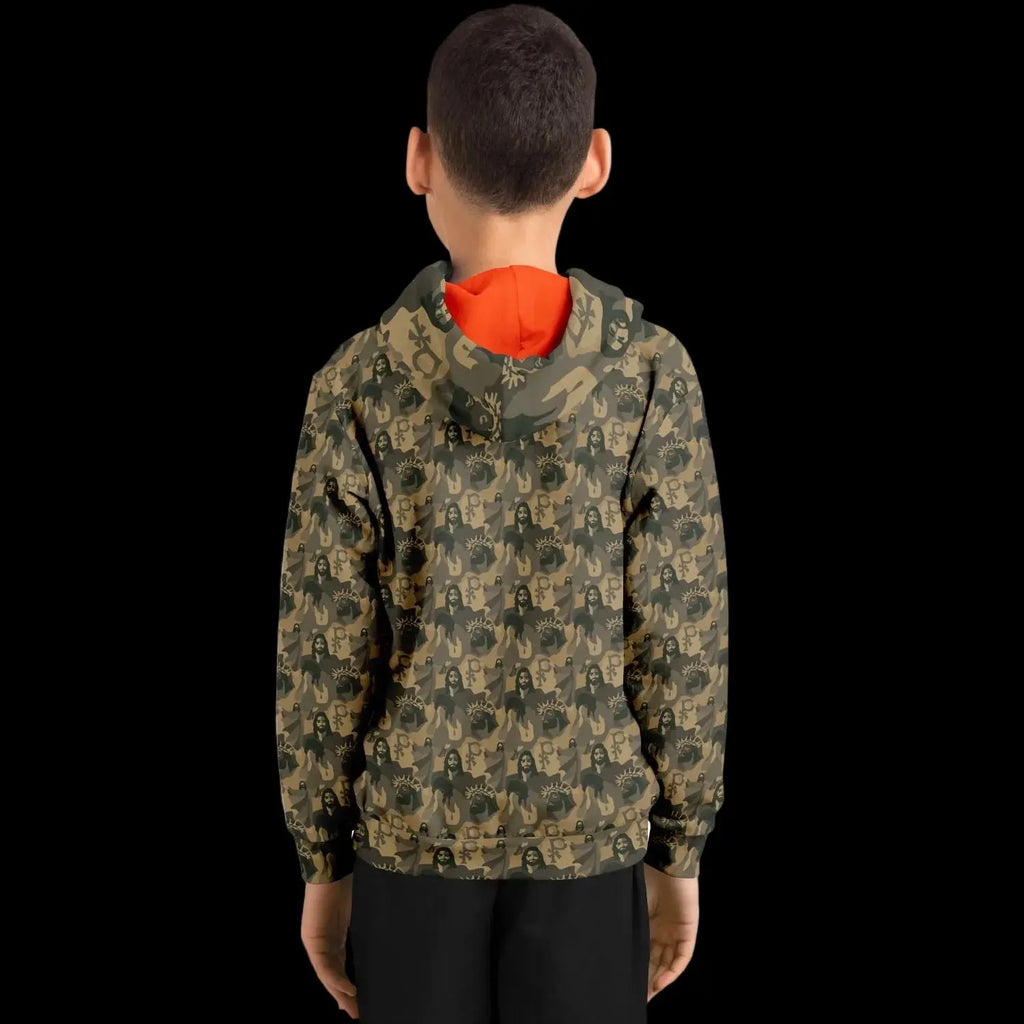 Mockup view of the back of a kids hoodie with a jesus camouflage pattern worn by a boy against a black background
