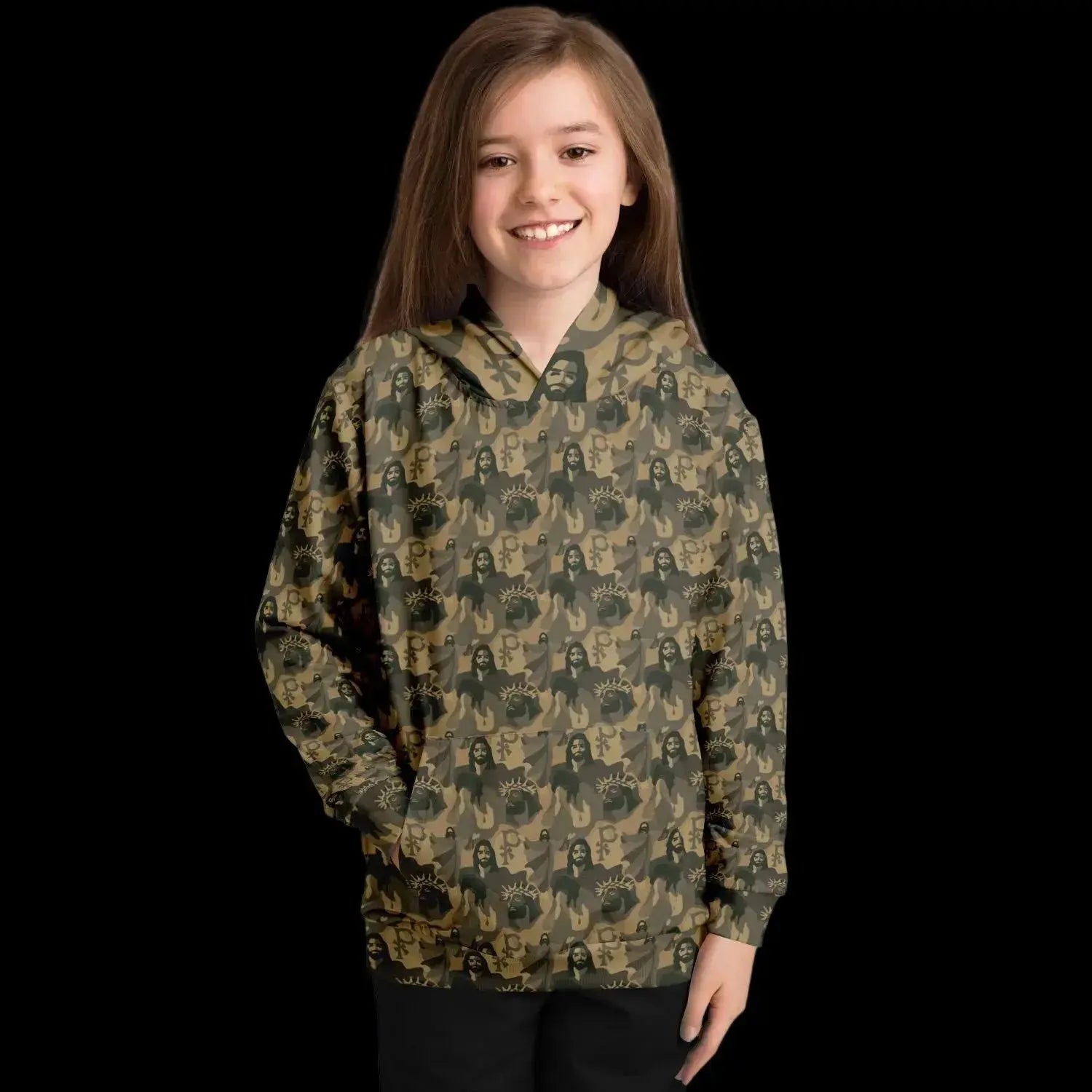 Mockup view of the front of a kids hoodie with a jesus camouflage pattern worn by a girl against a black background
